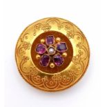 A Victorian High-Karat Gold (tested) Amethyst and Pearl Memorial Brooch. Cannetille bead-work and