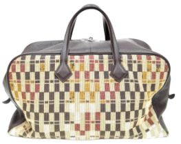 An Hermes 'Victoria' Luggage Bag. Textile and leather exterior with silver-toned hardware, 5