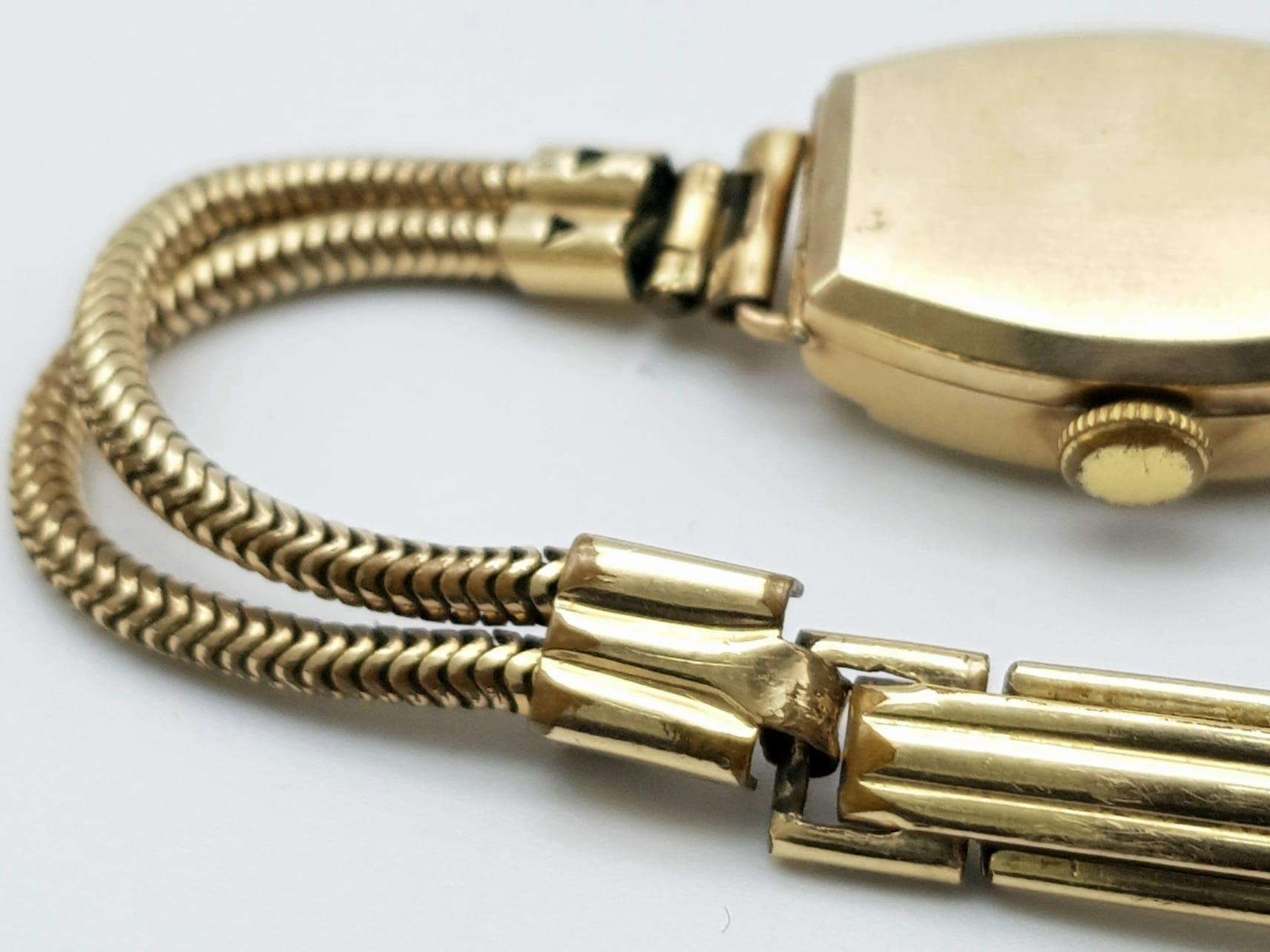 A vintage, 9 K yellow gold ISIS watch with a double snake chain bracelet. Case 19 x 15 mm, champagne - Image 5 of 6