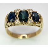 An 18 K yellow gold ring with three oval cut blue/green sapphires and diamonds in between. Size: