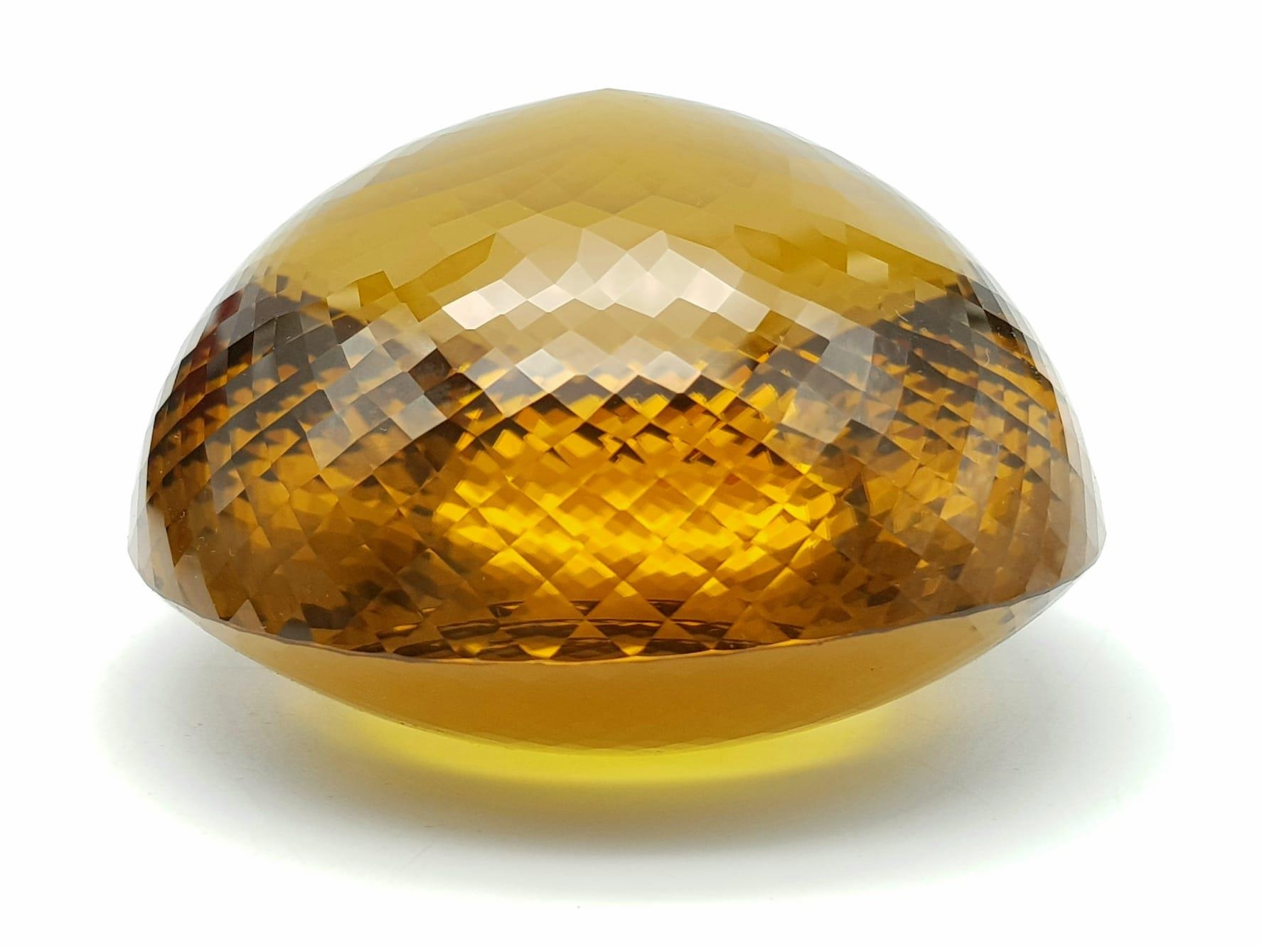 An Immense 3632ct Citrine Quartz Gemstone. Oval cut and beautifully faceted. 10 x 9cm. Comes with - Image 7 of 13