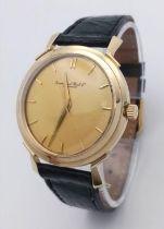 A Vintage 14k Gold Cased International Watch Company Automatic Gents Watch. Black crocodile strap.