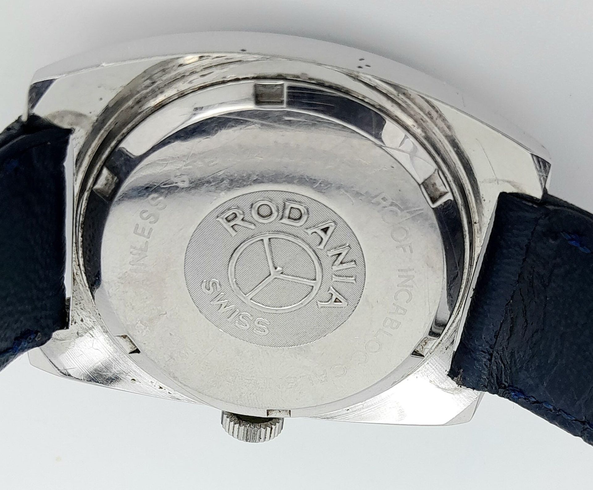 A Vintage Rodania Mechanical Gents Watch. Blue leather strap. Stainless steel case - 32mm. Purple - Image 6 of 8