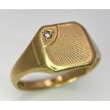 A VINTAGE GENTS 9K GOLD SIGNET RING WITH SMALL DIAMOND . 5.1gms size W