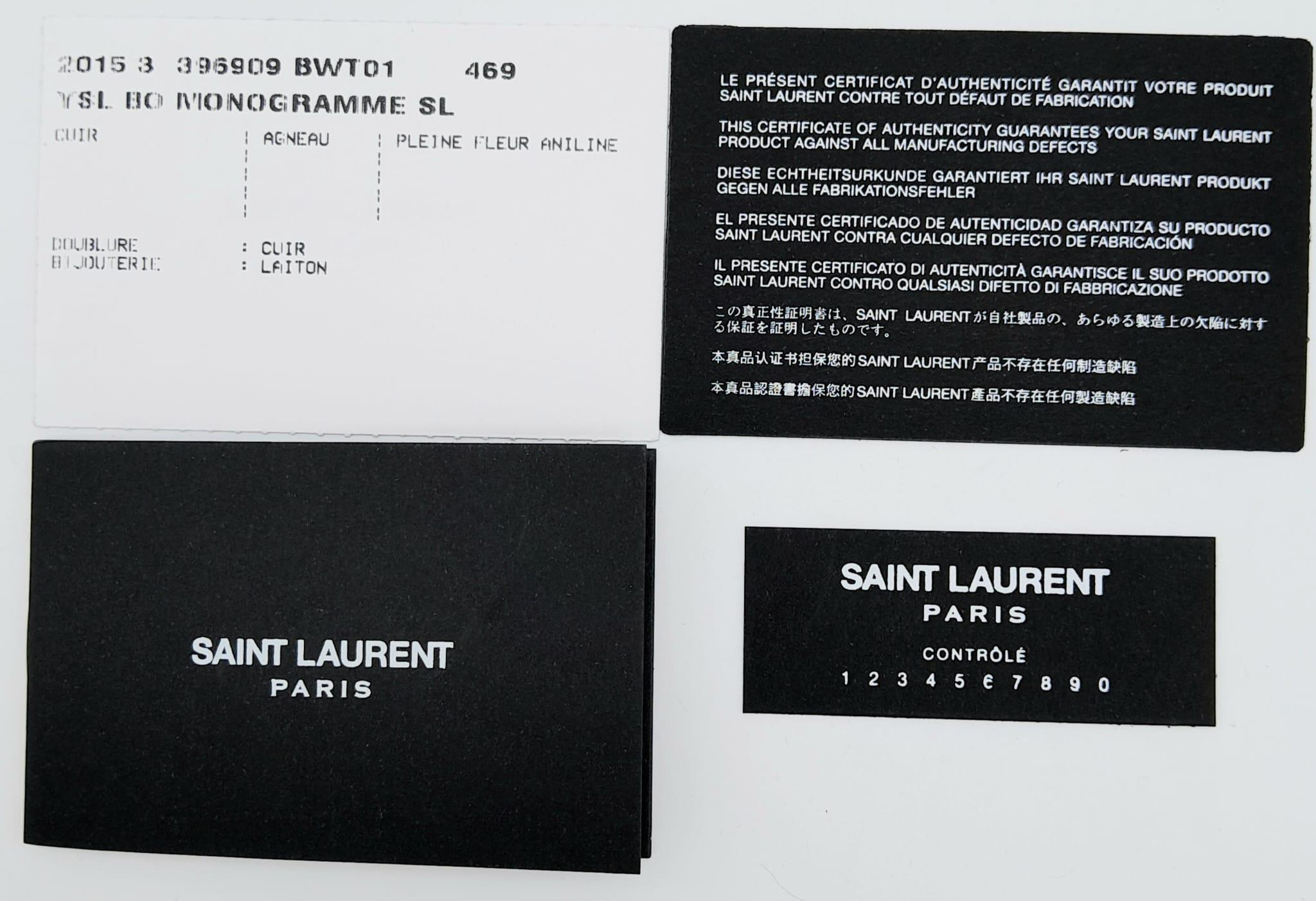 A Saint Laurent envelope shoulder bag, soft beige calfskin with gold hardware and strap, press - Image 10 of 11