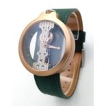 A Verticale Mechanical Top Winder Unisex Watch. Green leather strap. Rose gold tone ceramic gilded