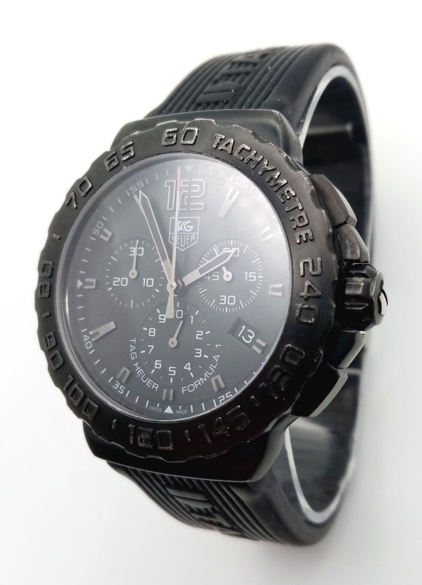 A Tag Heuer Formula 1 Chronograph Gents Quartz Watch. Black Tag rubber strap. Black dial with