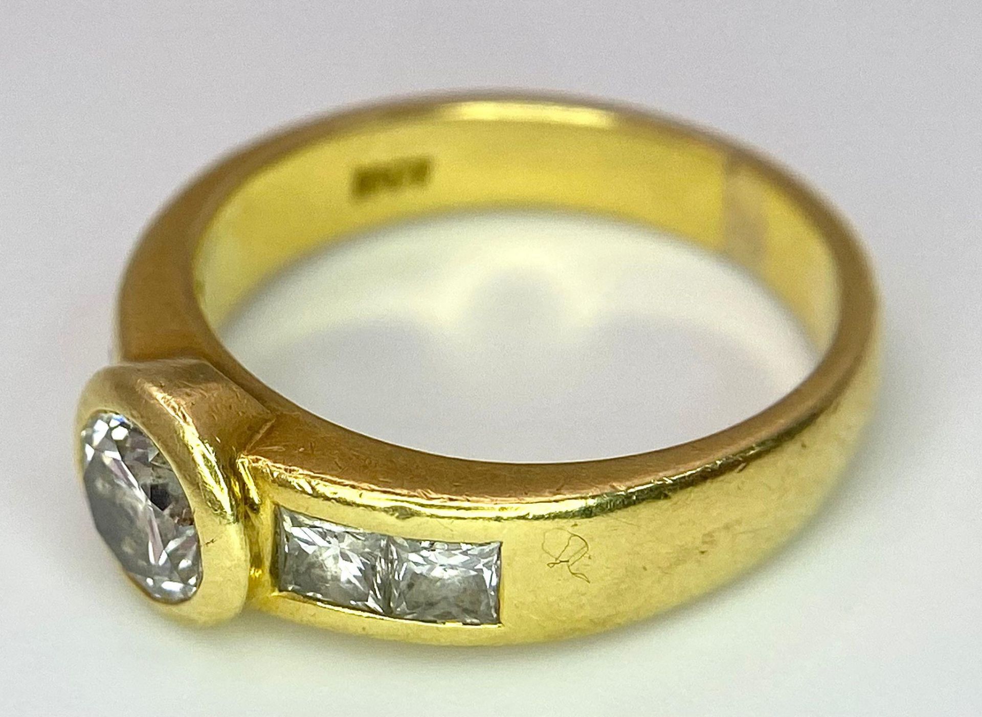 An 18K Yellow Gold Diamond Ring - Main 0.45ct bright white centre stone with 0.35ctw of diamond - Image 7 of 9