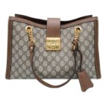 A Gucci GG padlock medium shoulder bag, gold tone hardware, brown suede leather interior. Size