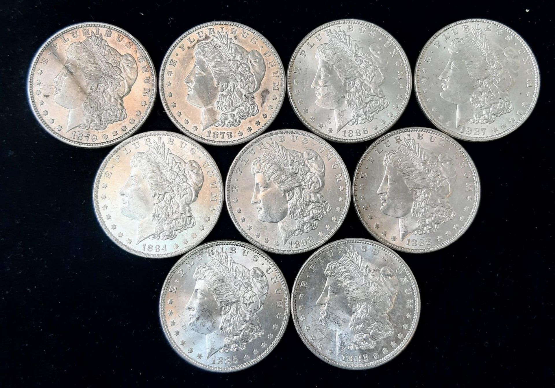 A Collection of Nine Silver One Dollar Coins - 1878, 79, 82, 84, 85, 86, 87, 88 and 98. Please see - Image 2 of 2