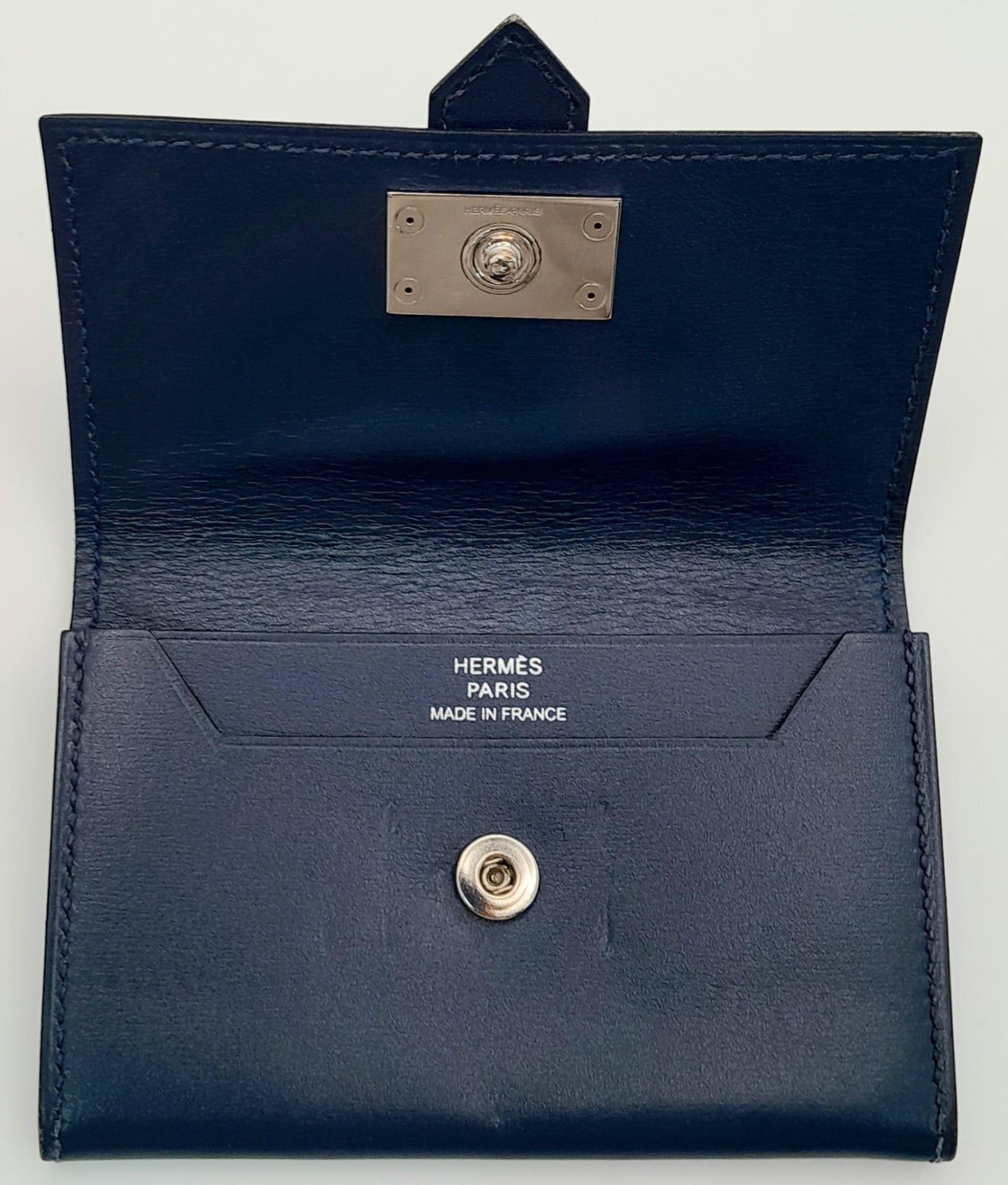 A Small Blue Leather Hermes Ladies Wallet. Flap design with Letter H branding. In good condition but - Image 5 of 7