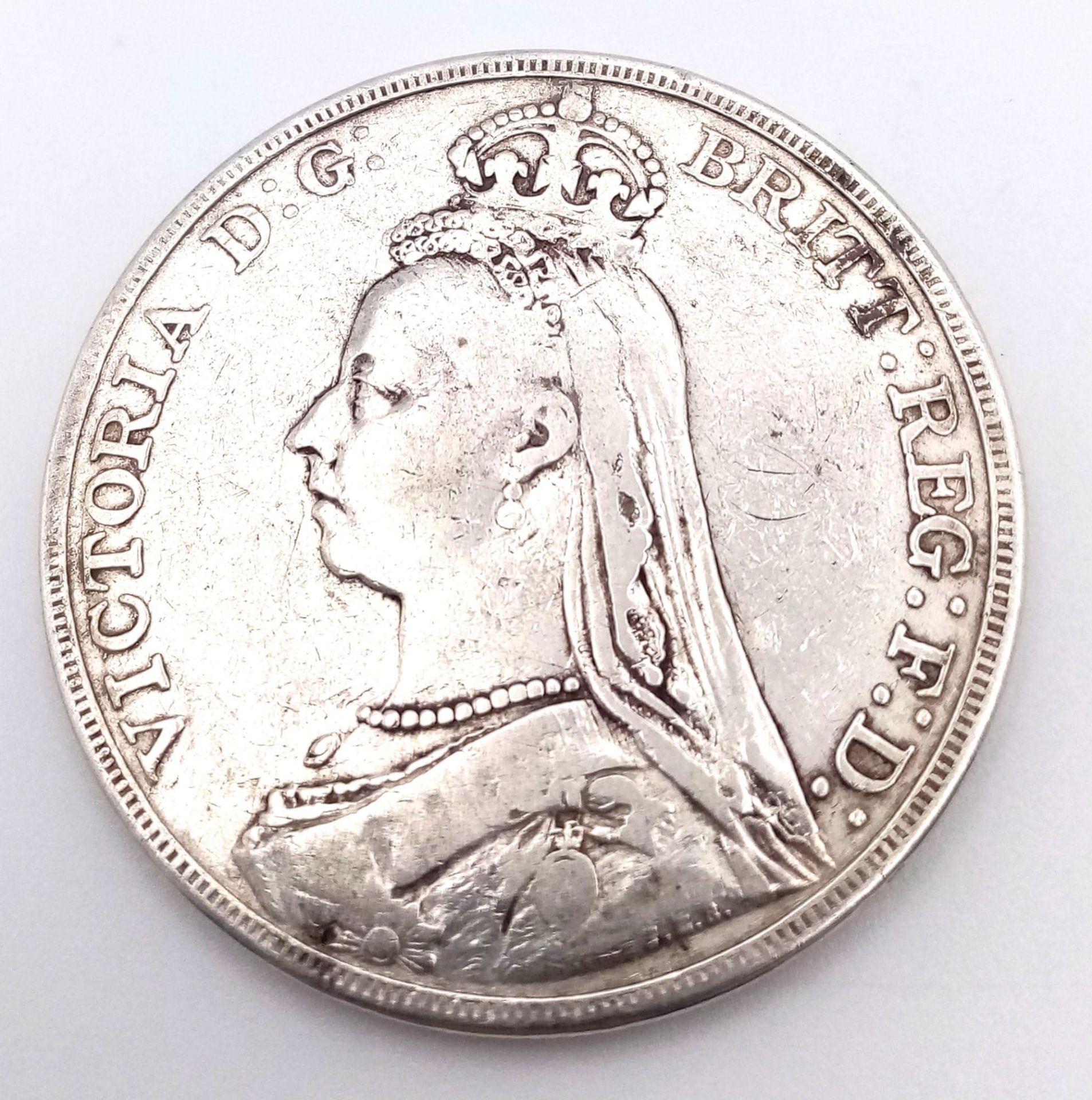 An 1892 Queen Victoria Silver Crown Coin. VF grade but please see photos. - Bild 2 aus 2