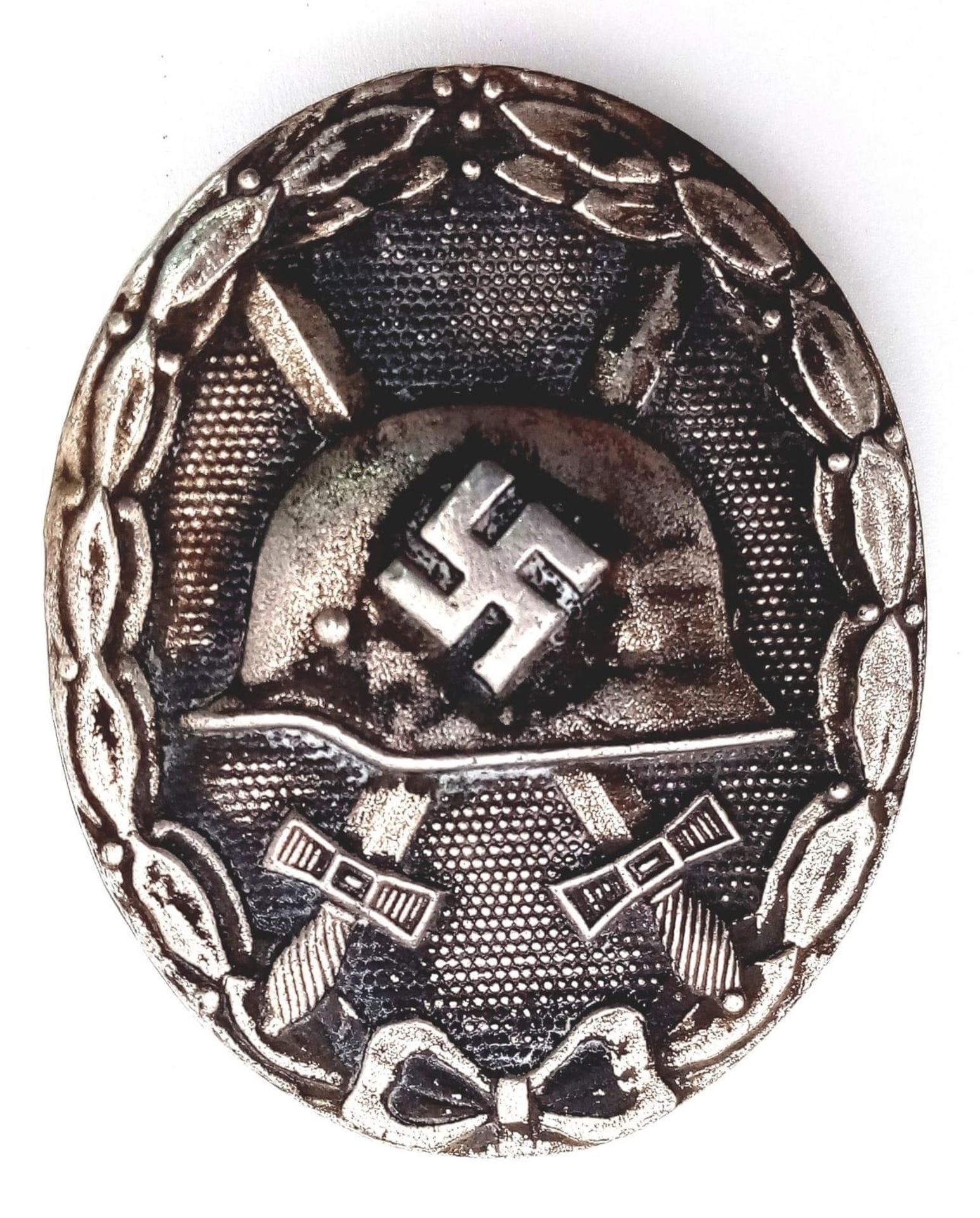 3rd Reich Silver Wound Badge. Awarded for being wounded 3 or 4 times. Ldo Numbered L/56 For Robert