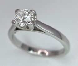 An 18K White Gold Diamond Solitaire Ring. A 0.58ct brilliant round cut diamond. Size K. 3.15g