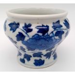 AN 18TH CENTURY BLUE AND WHITE PORCELAIN SMALL POT WITH A 2mm CRACK ON THE BOTTOM . 8cms AT RIM