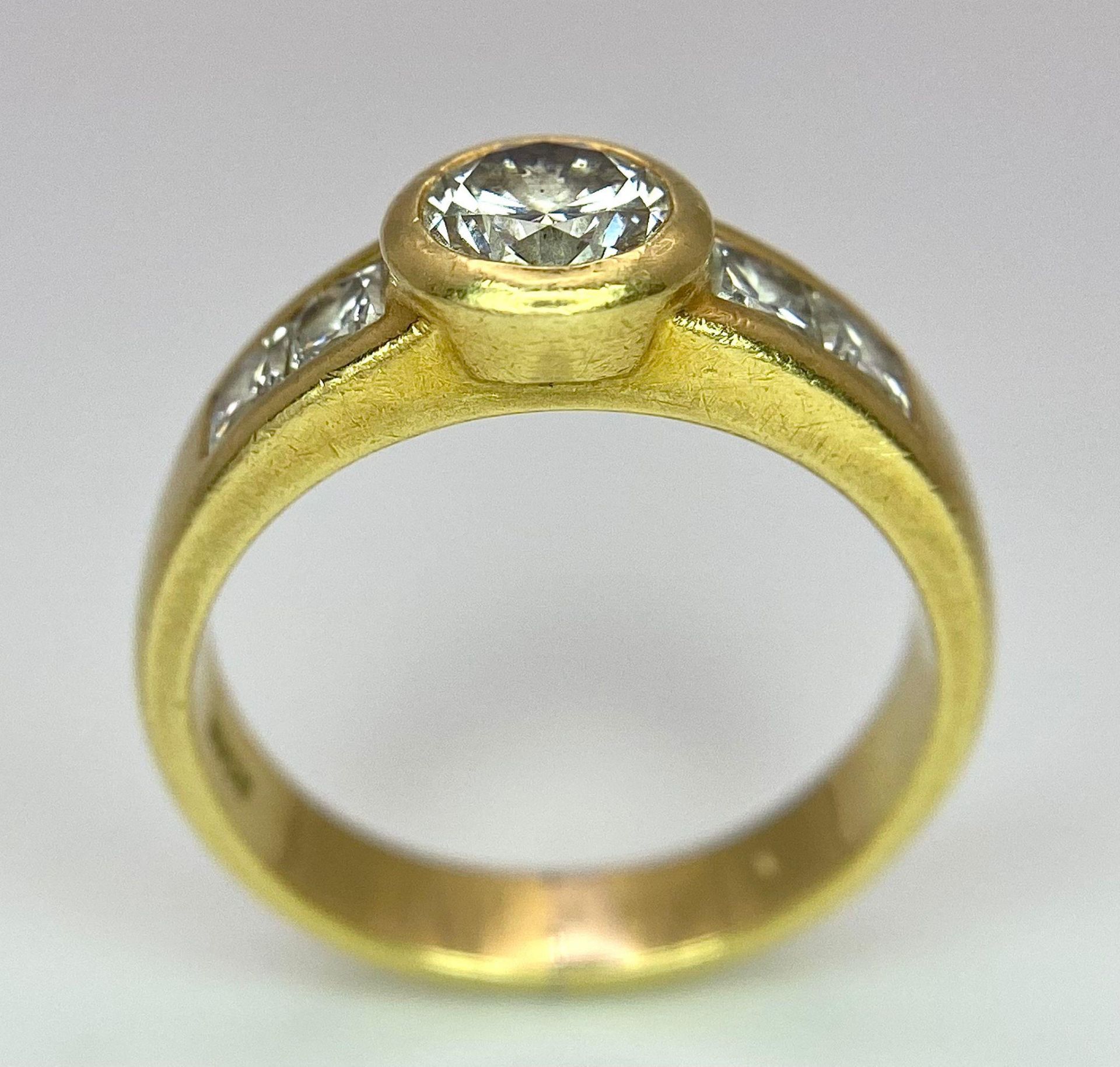 An 18K Yellow Gold Diamond Ring - Main 0.45ct bright white centre stone with 0.35ctw of diamond - Image 4 of 9