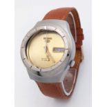 A Vintage Seiko 5 Automatic Gents Watch. Brown leather strap. Stainless steel case - 37mm. Gold tone