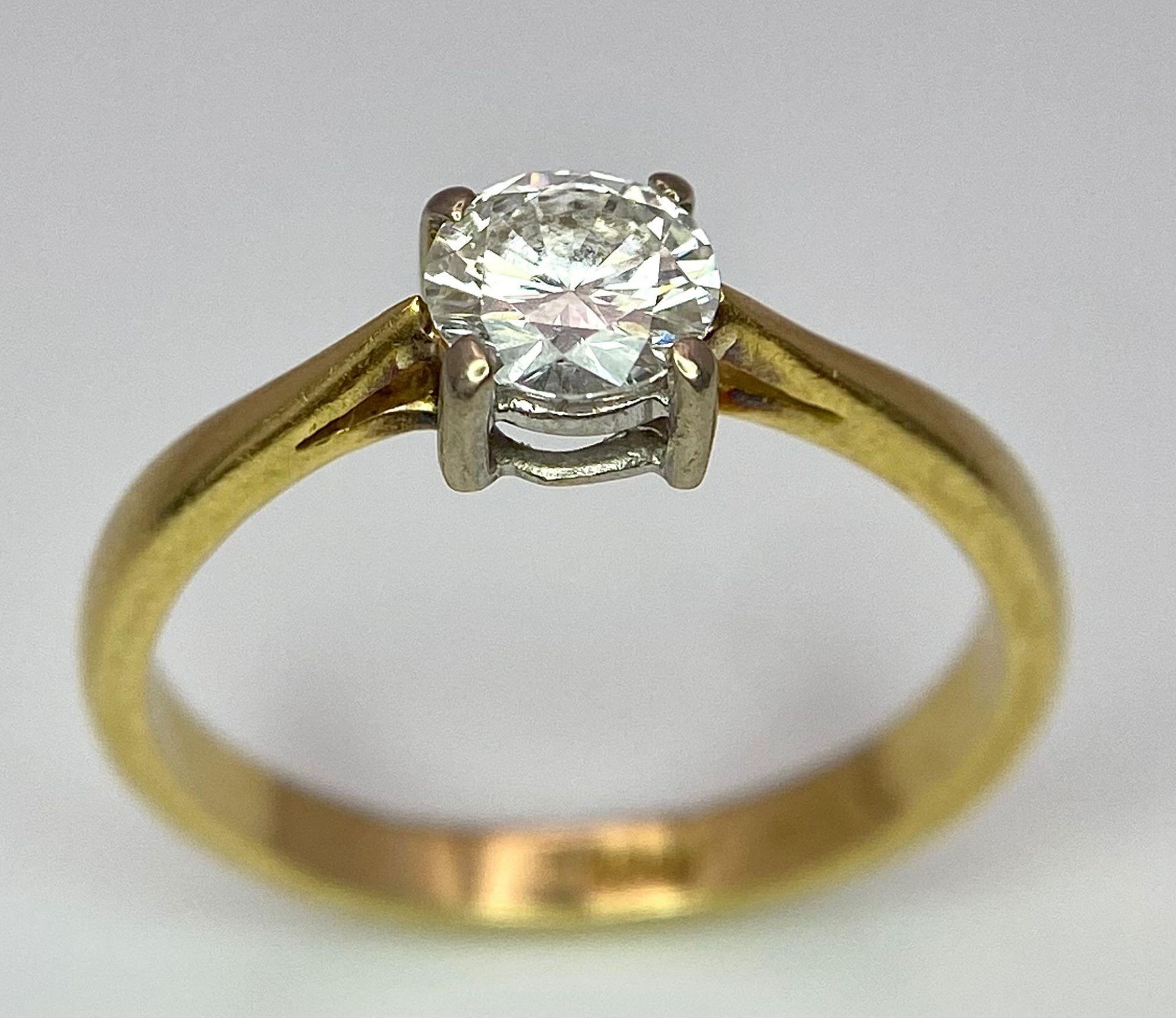 An 18K Yellow Gold Diamond Solitaire Ring. Brilliant round cut - 0.45ctw. 2.5g total weight. Size L. - Image 4 of 7