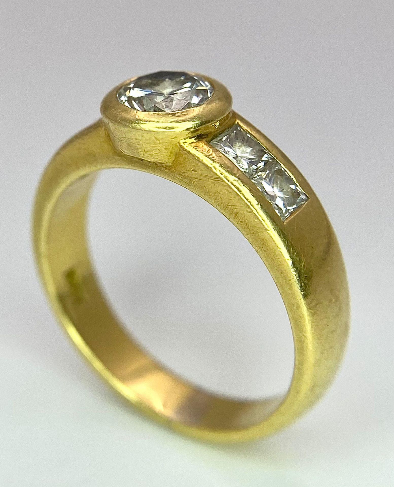An 18K Yellow Gold Diamond Ring - Main 0.45ct bright white centre stone with 0.35ctw of diamond - Image 6 of 9
