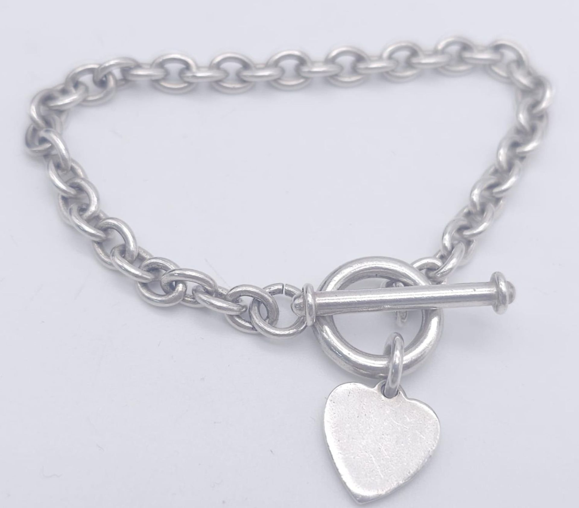 A Sterling silver T-bar heart necklace with matching 20cm bracelet. 54.3g total weight. - Bild 6 aus 8