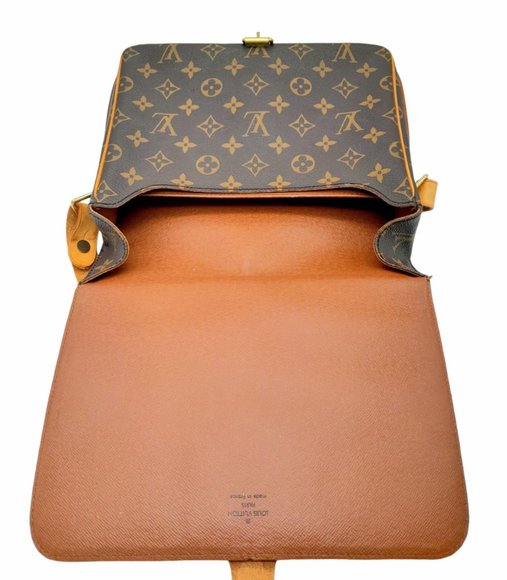 A Vintage Louis Vuitton Cartouchiere Shoulder Bag. LV monogram canvas exterior with cow-hide leather - Image 7 of 9