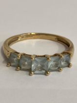 Fabulous 9 carat YELLOW GOLD RING, Set with 5 x PRINCESS CUT AQUAMARINE GEMSTONES. Full UK hallmark.