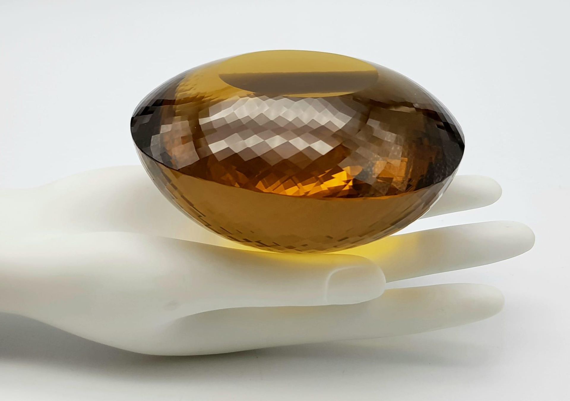 An Immense 3632ct Citrine Quartz Gemstone. Oval cut and beautifully faceted. 10 x 9cm. Comes with - Image 2 of 13
