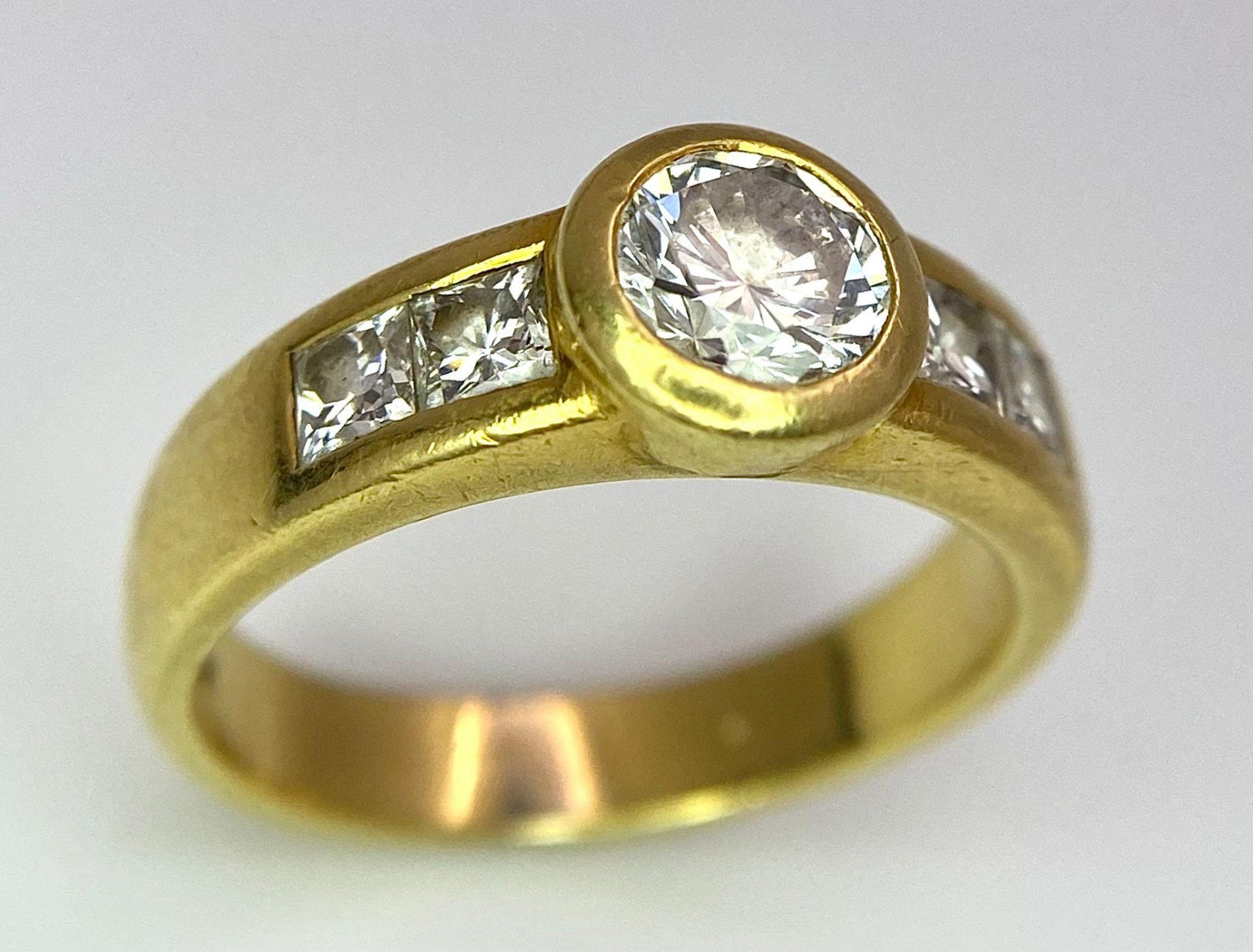 An 18K Yellow Gold Diamond Ring - Main 0.45ct bright white centre stone with 0.35ctw of diamond - Image 3 of 9