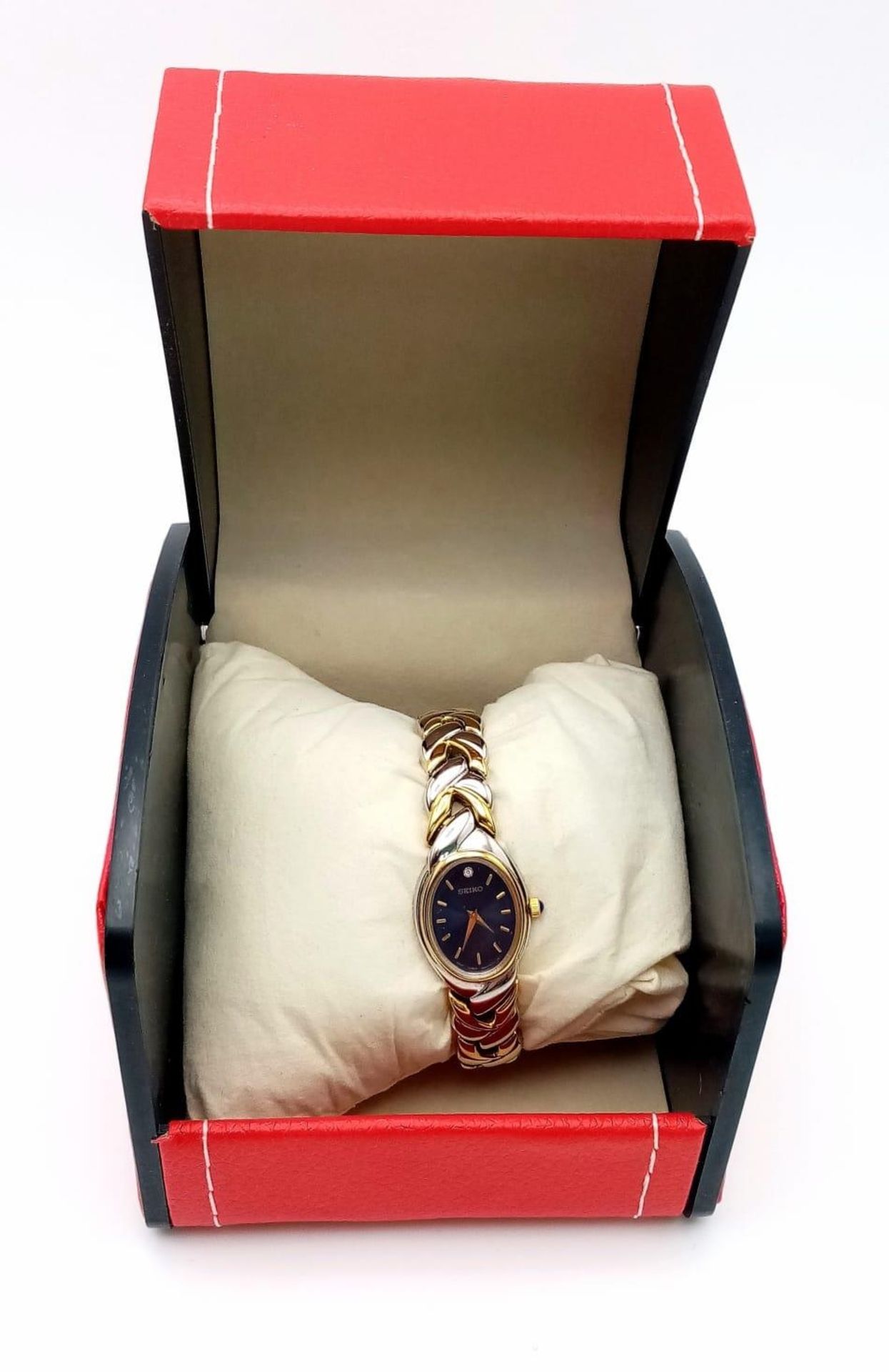 A Seiko Quartz Ladies Watch. Two tone strap and case - 19cm. Blue dial. In good condition and - Bild 7 aus 7