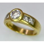 An 18K Yellow Gold Diamond Ring - Main 0.45ct bright white centre stone with 0.35ctw of diamond