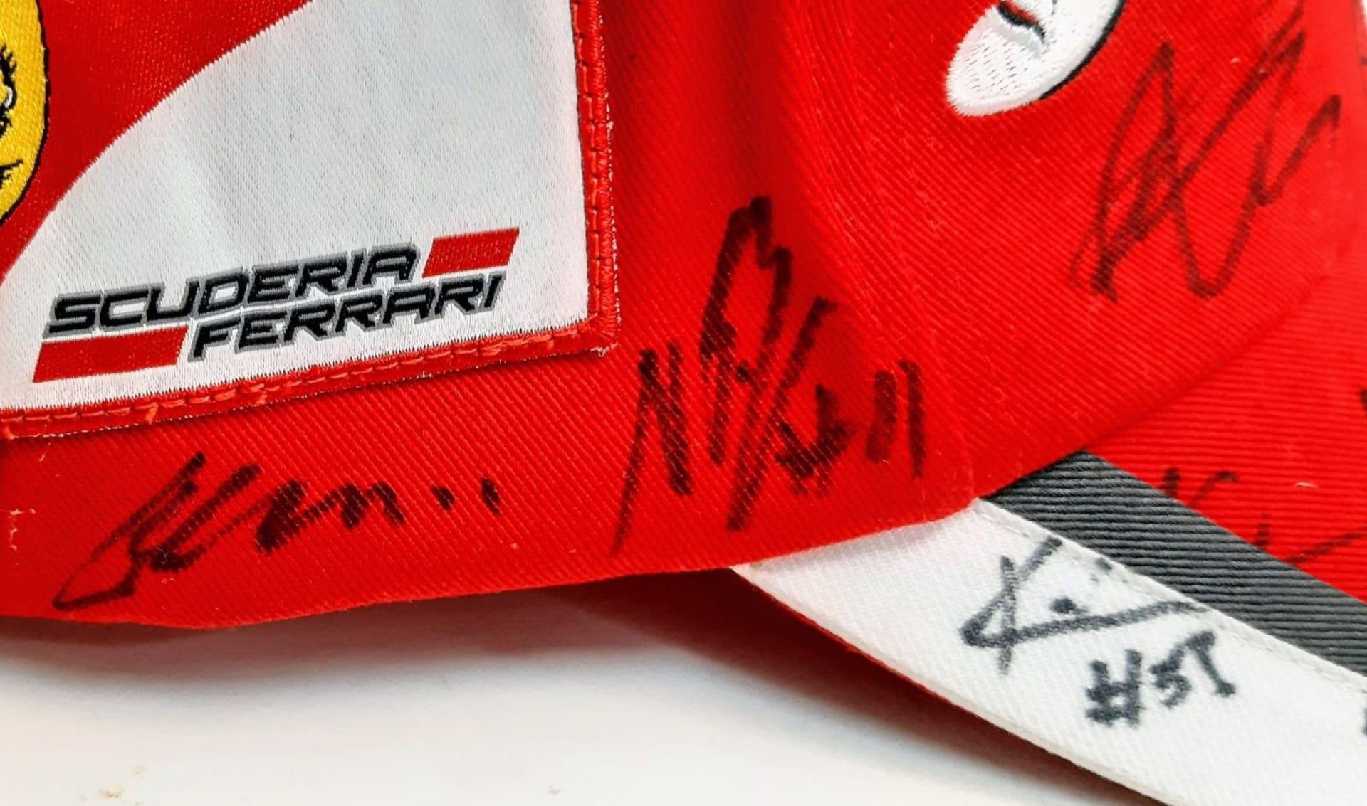 An Official Ferrari Team Cap - Over 20 signatures including Ferrari drivers and team principals. - Image 10 of 14