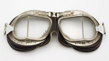 A Pair of Vintage RAF Pilot Goggles. Makers mark of Melton. In good condition but missing headband.