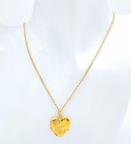 A 9K GOLD HEART LOCKET ON A 44cms 9K GOLD CHAIN , LOVELY CONDITION . 4.9gms