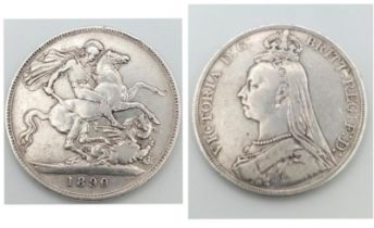 An 1890 Queen Victoria Silver Crown Coin. VF grade but please see photos.