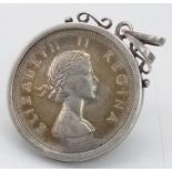 A 1957 South African Silver 5 Shilling Coin set in a 925 Silver Pendant Setting. 6cm.