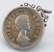 A 1957 South African Silver 5 Shilling Coin set in a 925 Silver Pendant Setting. 6cm.