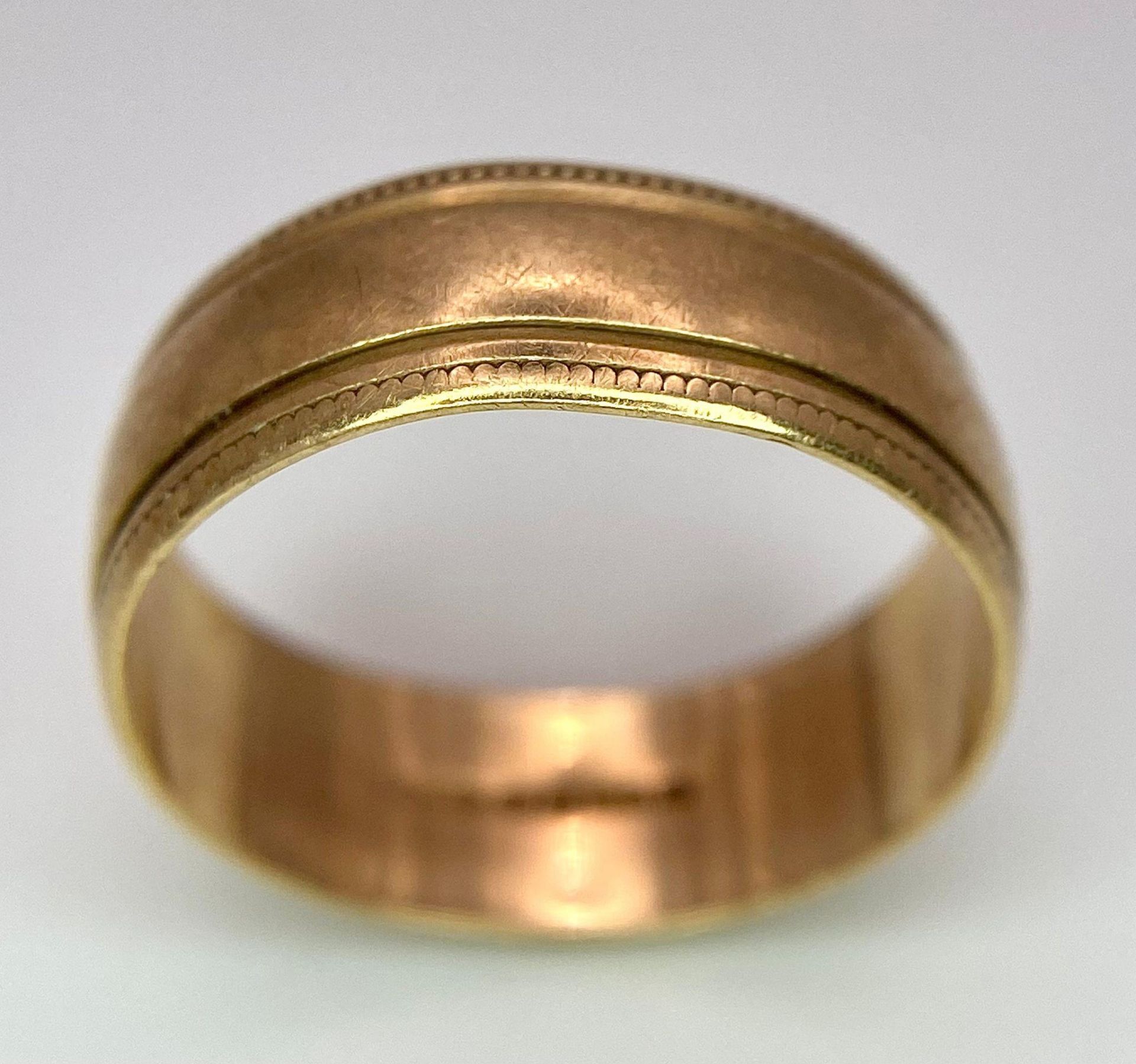 A 9 K yellow gold band ring with a pair of grooves. Size: L1/2. weight: 2.7 g. - Bild 2 aus 5