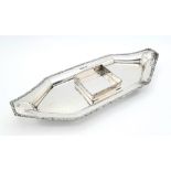 An antique sterling silver inkwell in boat shape (2 screws missing). Full hallmarks Sheffield, 1920.