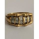 Fabulous 9 carat GOLD and DIAMOND RING. Having 10 x Round cut sparkling DIAMONDS set to top in