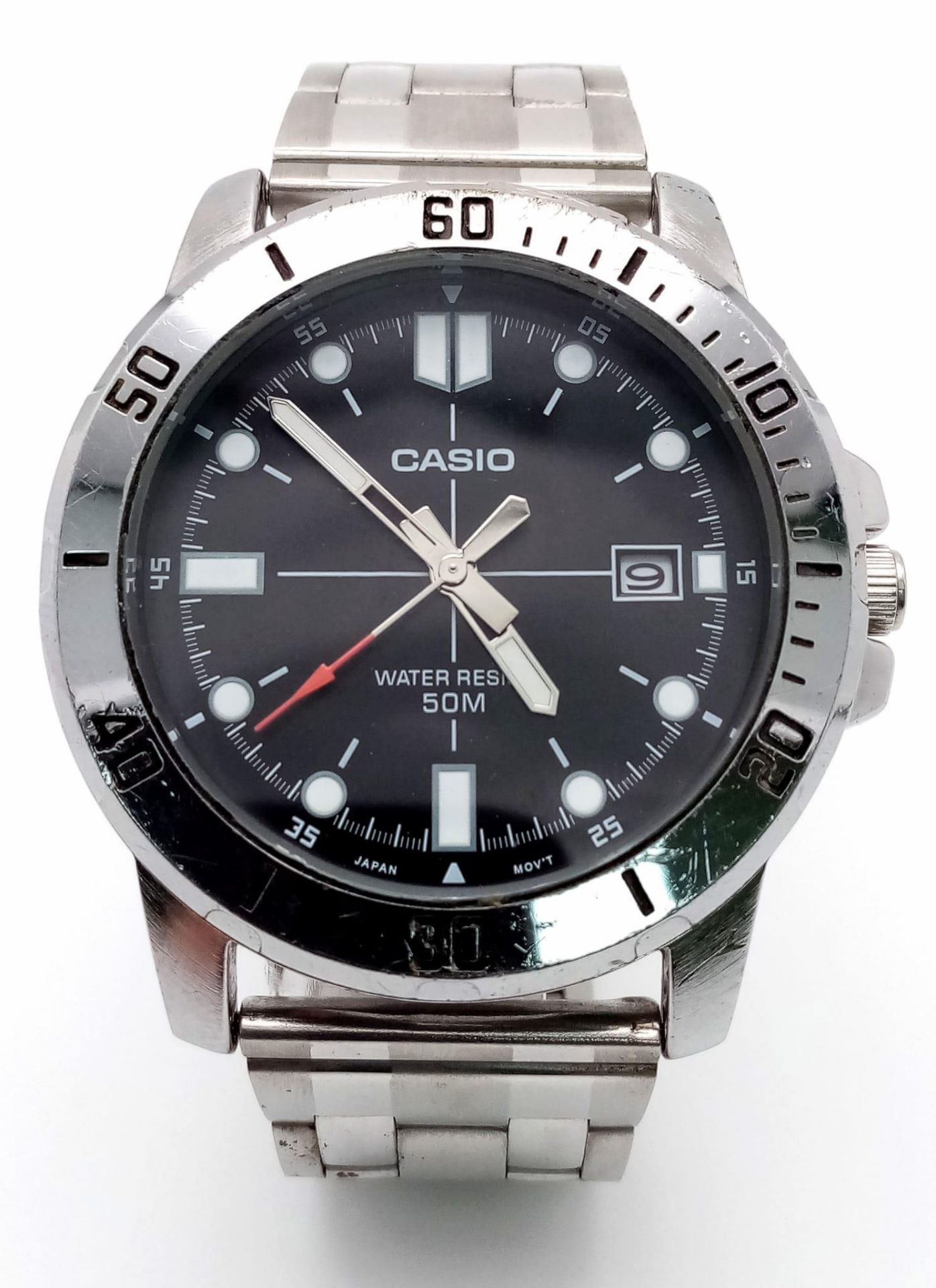 A Casio Quartz Gents Watch. Stainless steel bracelet and case - 44mm. Black dial with date window.