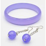 A traditional, Chinese, top notch, Lavender Jade, bangle and sterling silver matching earrings in