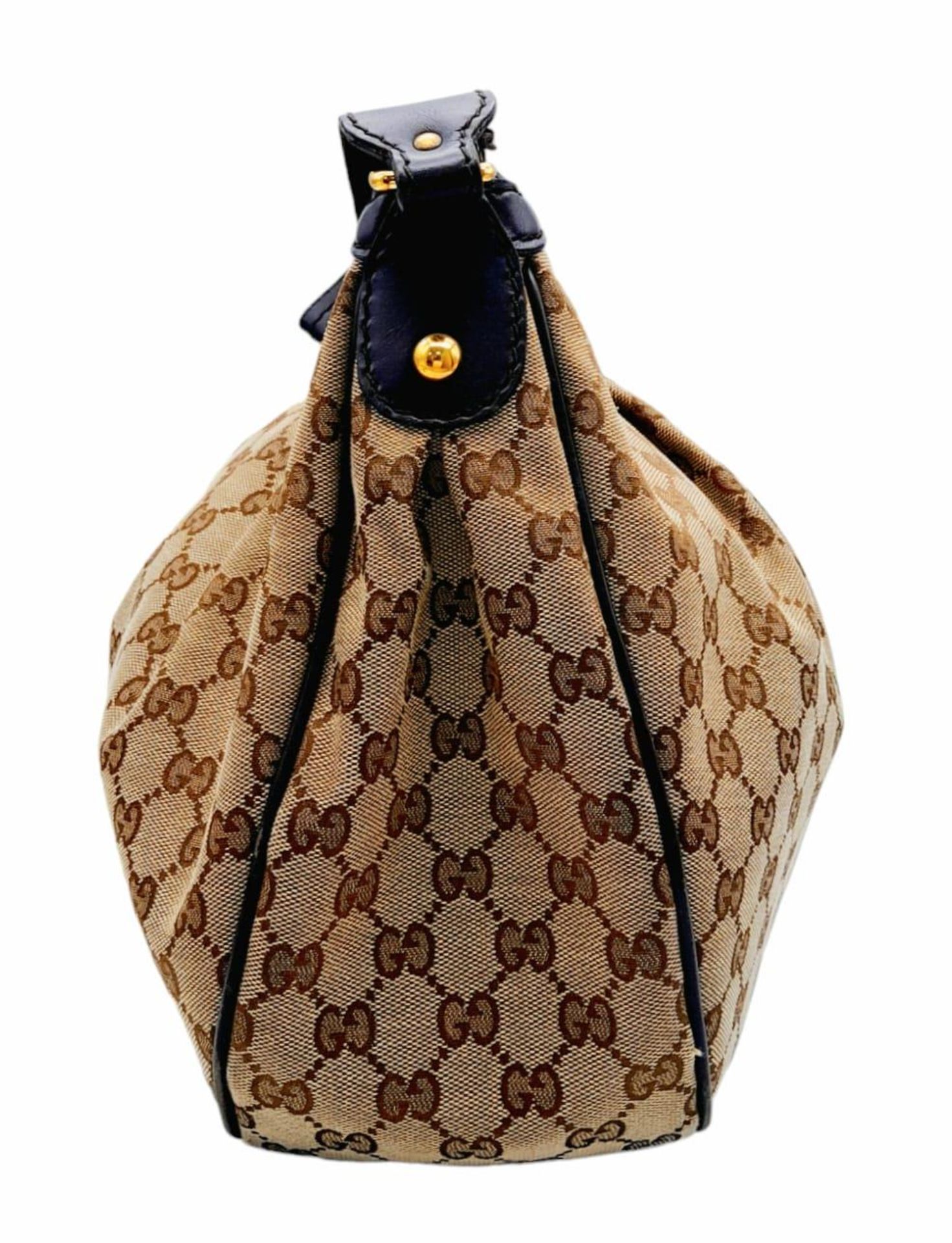 A Gucci Brown Monogram Suki Shoulder Bag. Pleated canvas exterior with leather trim and strap, - Image 2 of 9