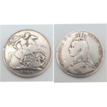 An 1889 Queen Victoria Silver Crown Coin. VF grade but please see photos.