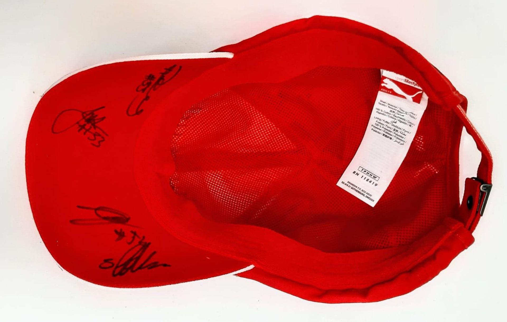 An Official Ferrari Team Cap - Over 20 signatures including Ferrari drivers and team principals. - Image 5 of 14