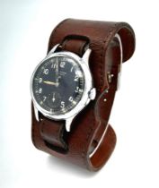 A Rare Vintage Universal Geneve Mechanical Gents Watch. Double leather strap. Stainless steel case -