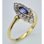 An 18K Yellow Gold Diamond and Blue Stone Ring. Marquise shape. Size M 1/2. 2.16g total weight. Ref: