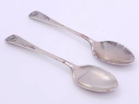 A pair of antique sterling silver tea spoons. Full hallmarks Sheffield, 1918. Total weight 22.7G.