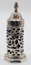 An antique sterling silver salt/pepper shaker with inner glass. Full hallmarks, Birmingham, 1902.