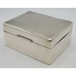 A vintage sterling silver cigarette box with wooden line. Total weight 351.85G. Dimension: L15.5cm X
