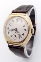 A Vintage 9K Yellow Gold Mechanical Ladies Watch. Brown leather strap. 9K Dennison gold case - 30mm.